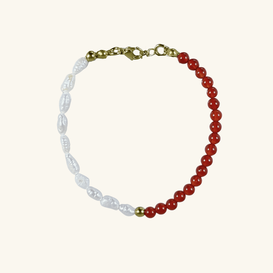 Handmade bracelet with half red agate beads and half Keshi freshwater pearls, finished with gold hardware.