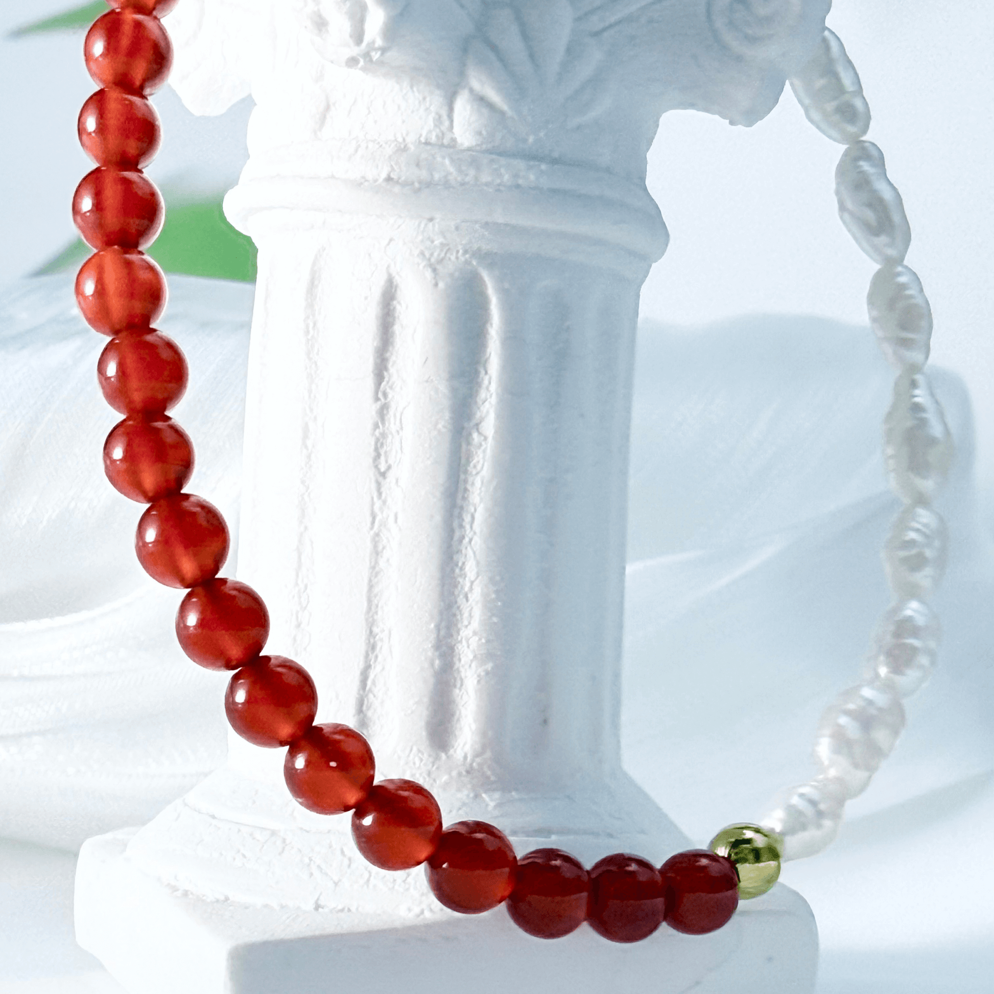 Handmade bracelet with half red agate beads and half Keshi freshwater pearls, finished with gold hardware.
