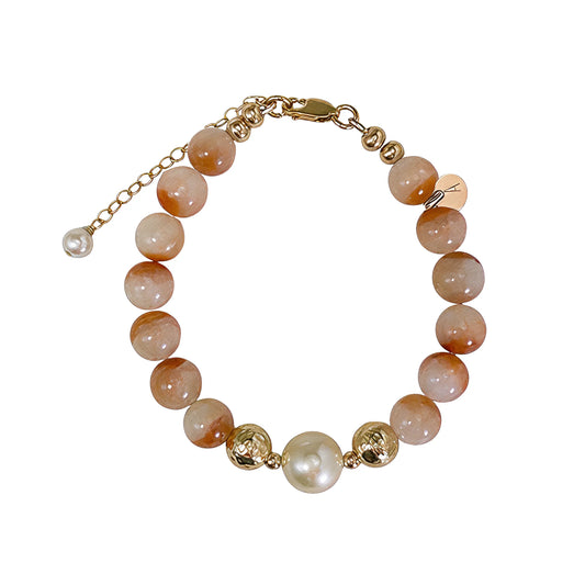A 14k gold filled beaded bracelet featuring red rabbit hair quartz and premium freshwater pearl with stamped initial disc - MXW Jewellery
