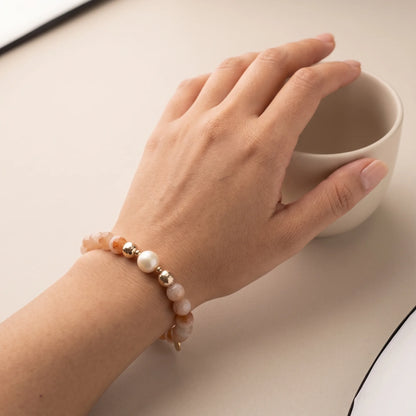A 14k gold filled beaded bracelet featuring red rabbit hair quartz and premium freshwater pearl with stamped initial disc - MXW Jewellery