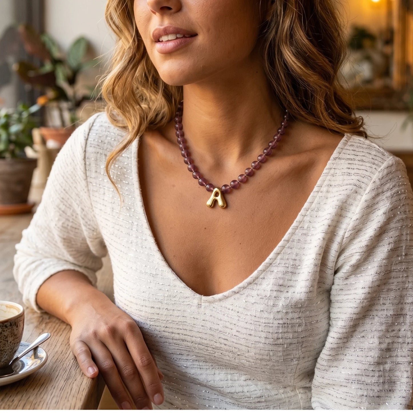 MXW Jewellery Red strawberry quartz beaded necklace with a gold bubble initial pendant.