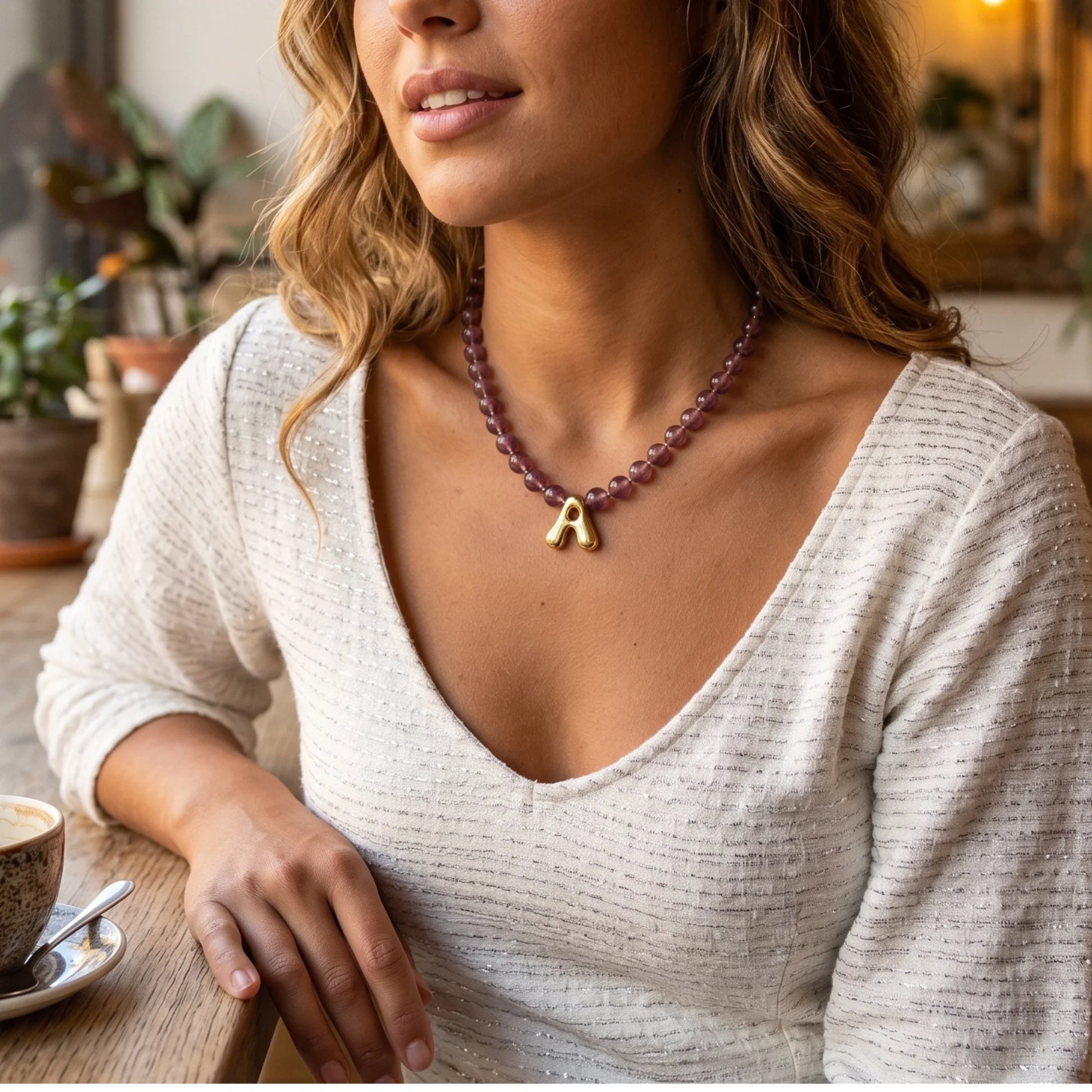 MXW Jewellery Red strawberry quartz beaded necklace with a gold bubble initial pendant.