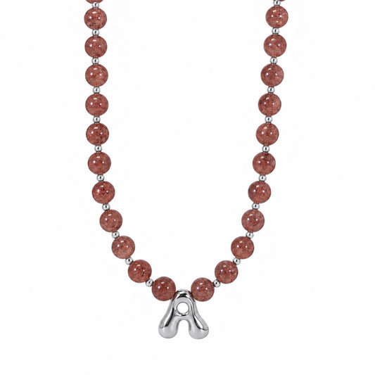 MXW Jewellery Red strawberry quartz beaded necklace with a silver bubble initial pendant.