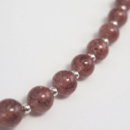 MXW Jewellery Red strawberry quartz beaded necklace with a silver bubble initial pendant.