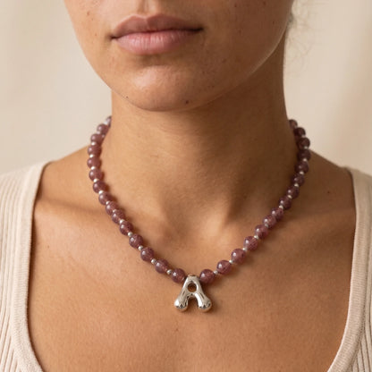 MXW Jewellery Red strawberry quartz beaded necklace with a silver bubble initial pendant.