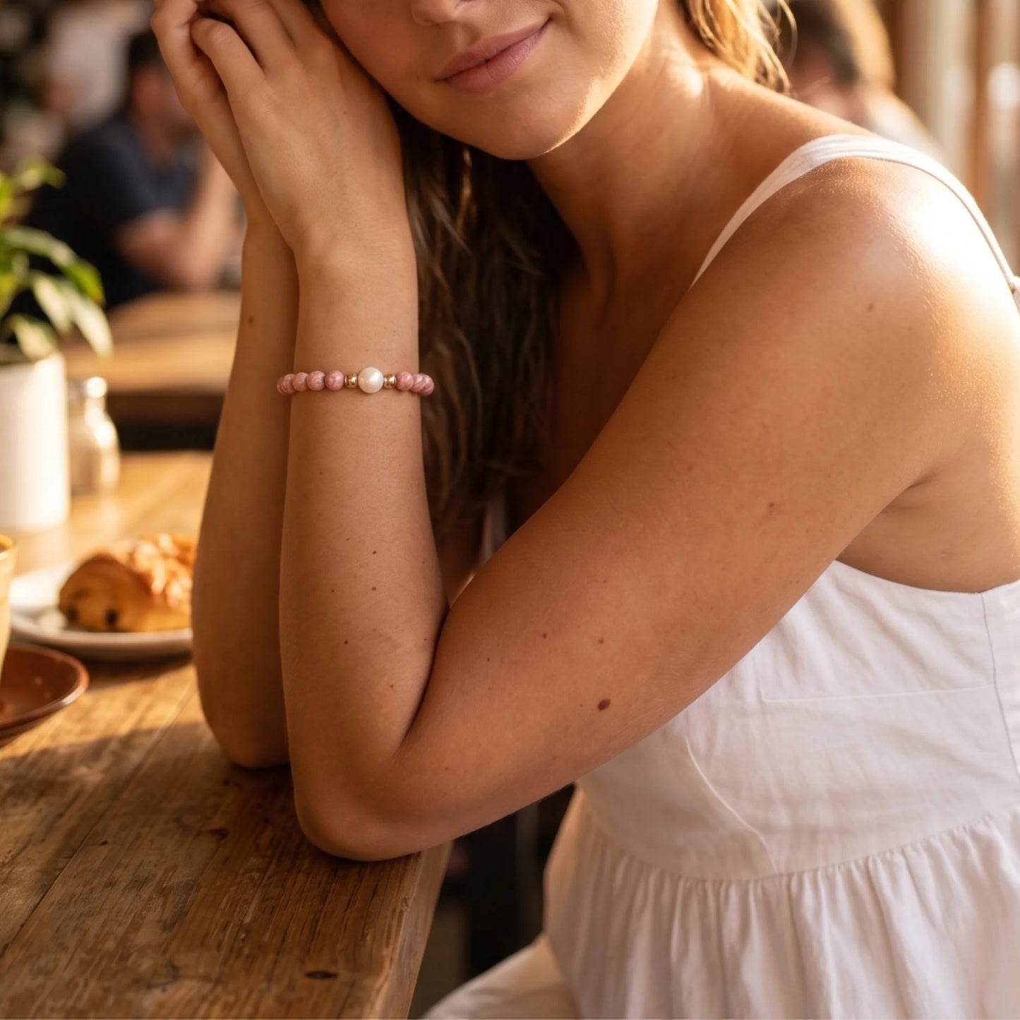 Rhodochrosite, pearl and initial gold bracelet featuring natural pink gemstone beads, lustrous freshwater pearls and a personalised gold-filled stamped initial disc.