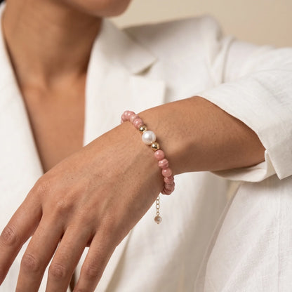 Rhodochrosite, pearl and initial gold bracelet featuring natural pink gemstone beads, lustrous freshwater pearls and a personalised gold-filled stamped initial disc.