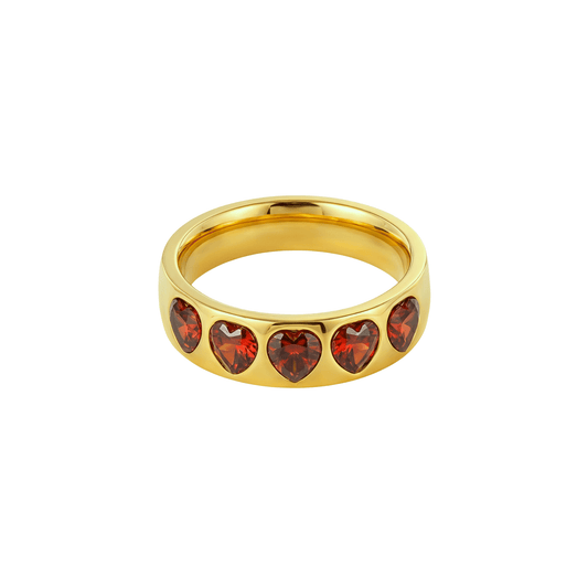 Gold ring with ruby-red heart-shaped zircon stones in a continuous band, waterproof jewellery by MXW.