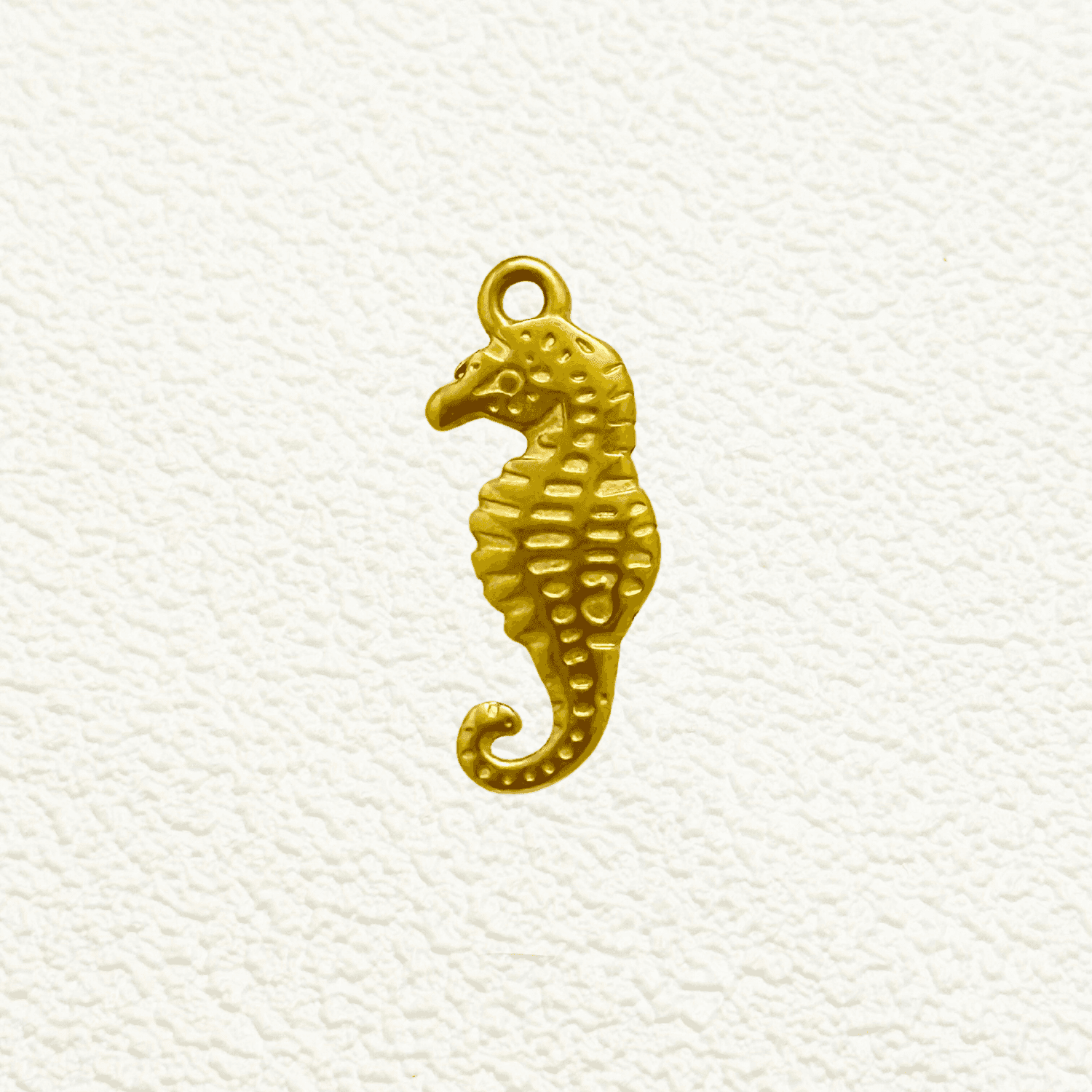 Gold Sculpted Spine Seahorse Charm with curled tail and detailed texture