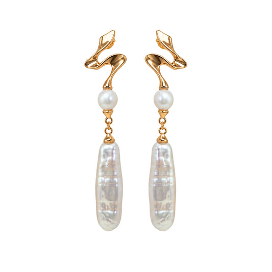 MXW gold vermeil drop earrings with a sculpted wave stud, a round freshwater pearl and a long baroque pearl drop.