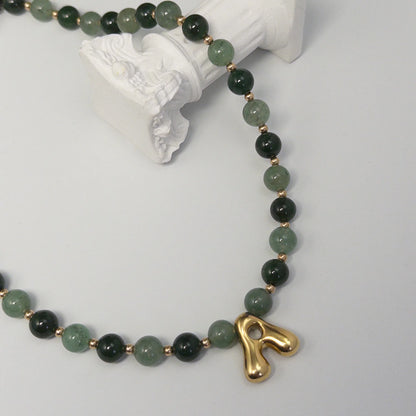 14K gold filled initial necklace with alternating nephrite jade and green aventurine beads and a bubble letter pendant
