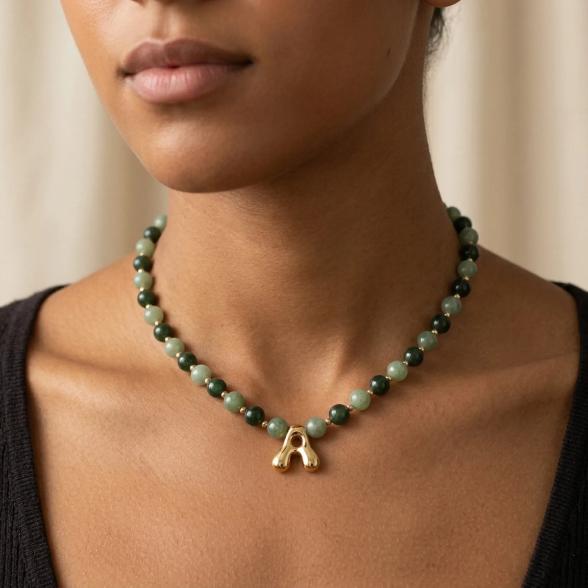 14K gold filled initial necklace with alternating nephrite jade and green aventurine beads and a bubble letter pendant