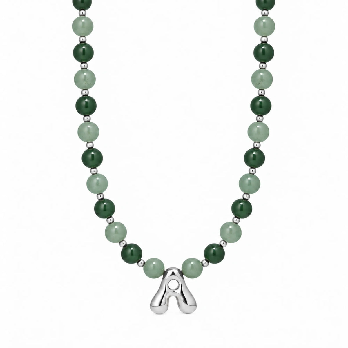 sterling silver necklace with alternating nephrite jade and green aventurine beads and a bubble letter pendant.