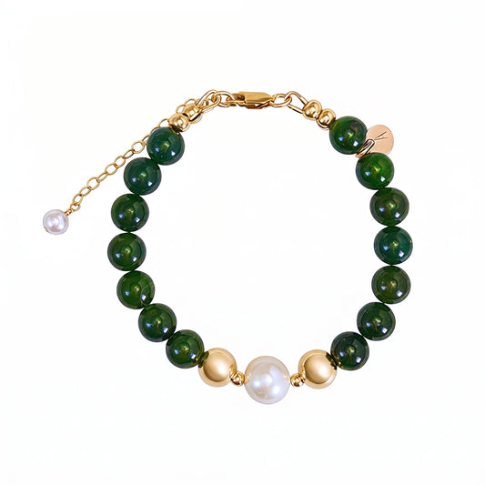 Siberian nephrite jade, pearl and initial bracelet featuring deep green gemstone beads, lustrous freshwater pearls and a personalised stamped 14K gold-filled initial disc.