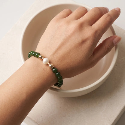 Siberian nephrite jade, pearl and initial bracelet featuring deep green gemstone beads, lustrous freshwater pearls and a personalised stamped 14K gold-filled initial disc.