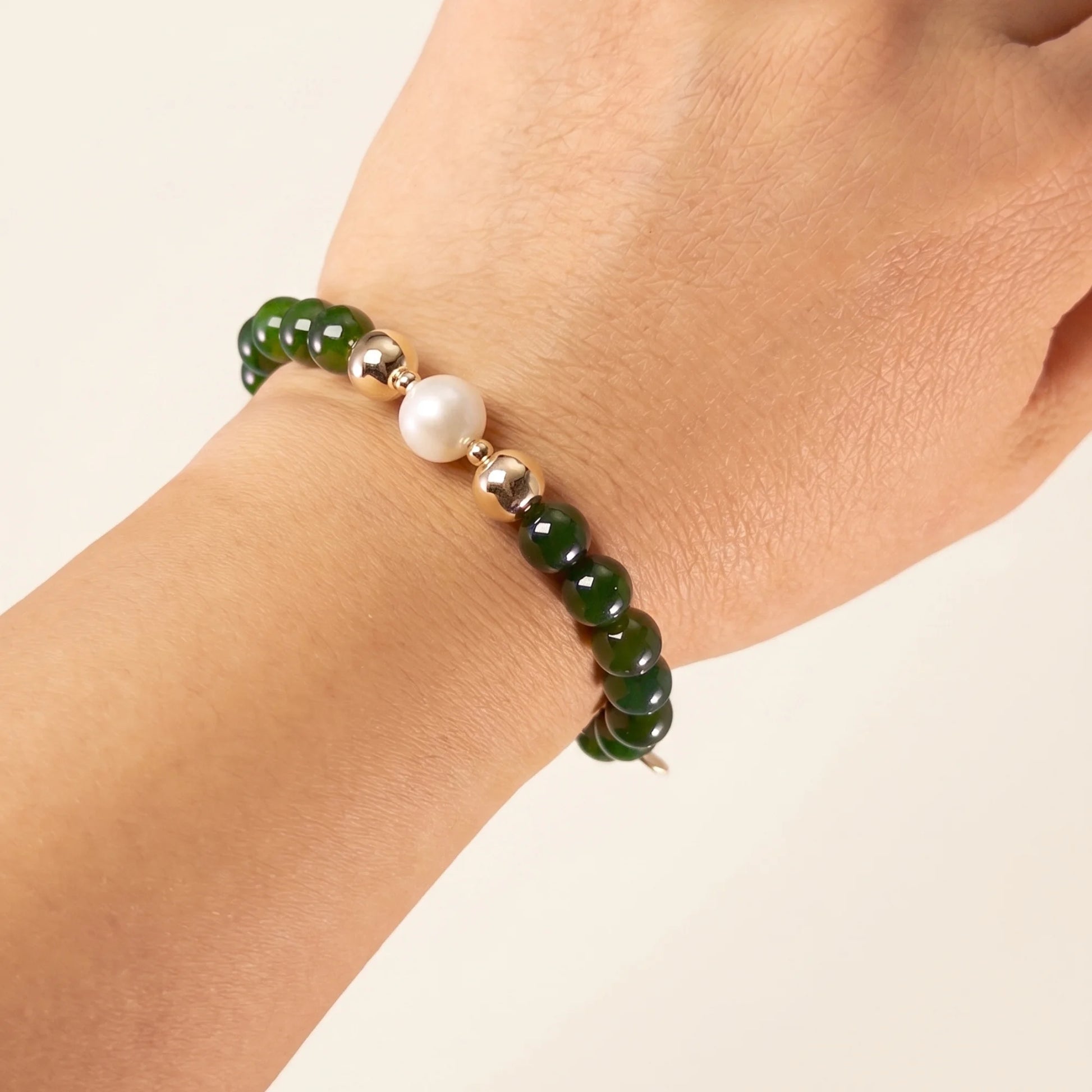 Siberian nephrite jade, pearl and initial bracelet featuring deep green gemstone beads, lustrous freshwater pearls and a personalised stamped 14K gold-filled initial disc.