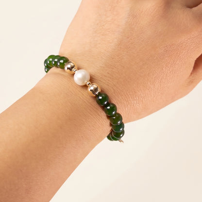 Siberian nephrite jade, pearl and initial bracelet featuring deep green gemstone beads, lustrous freshwater pearls and a personalised stamped 14K gold-filled initial disc.