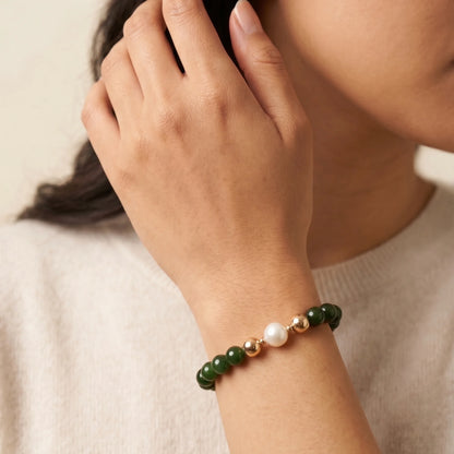 Siberian nephrite jade, pearl and initial bracelet featuring deep green gemstone beads, lustrous freshwater pearls and a personalised stamped 14K gold-filled initial disc.