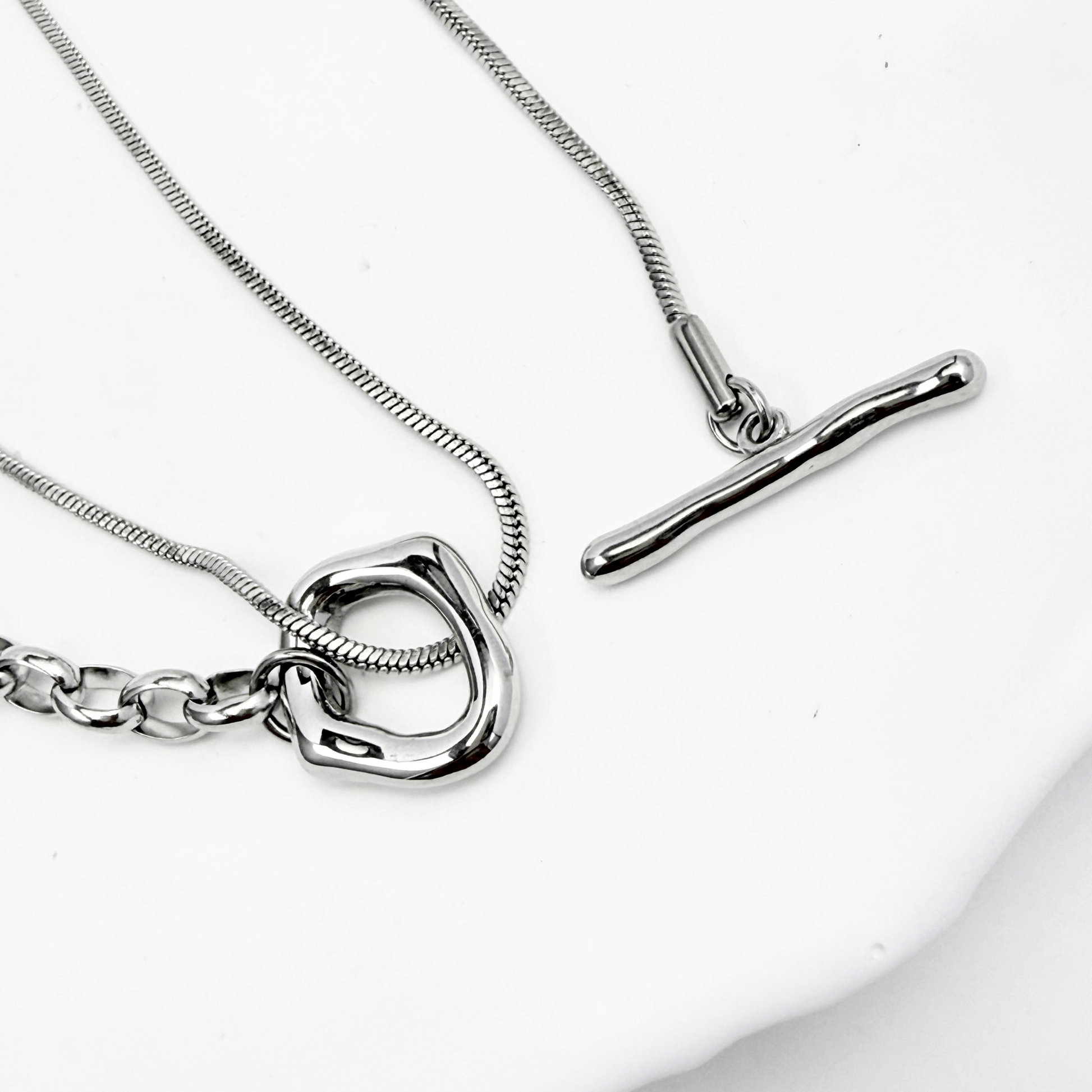 silver asymmetric T-bar lariat necklace with mixed chain design