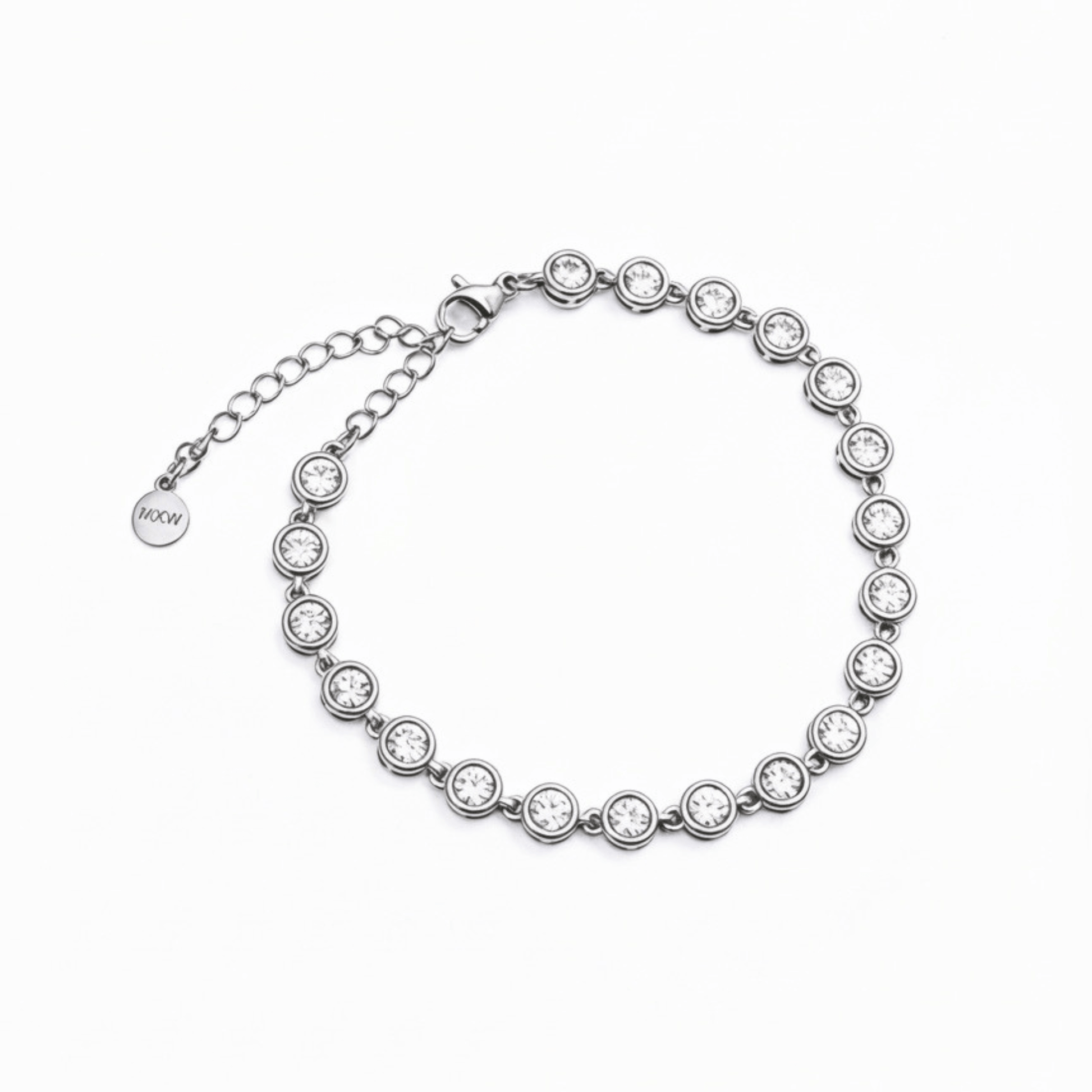 crystal tennis bracelet with bezel-set clear stones.