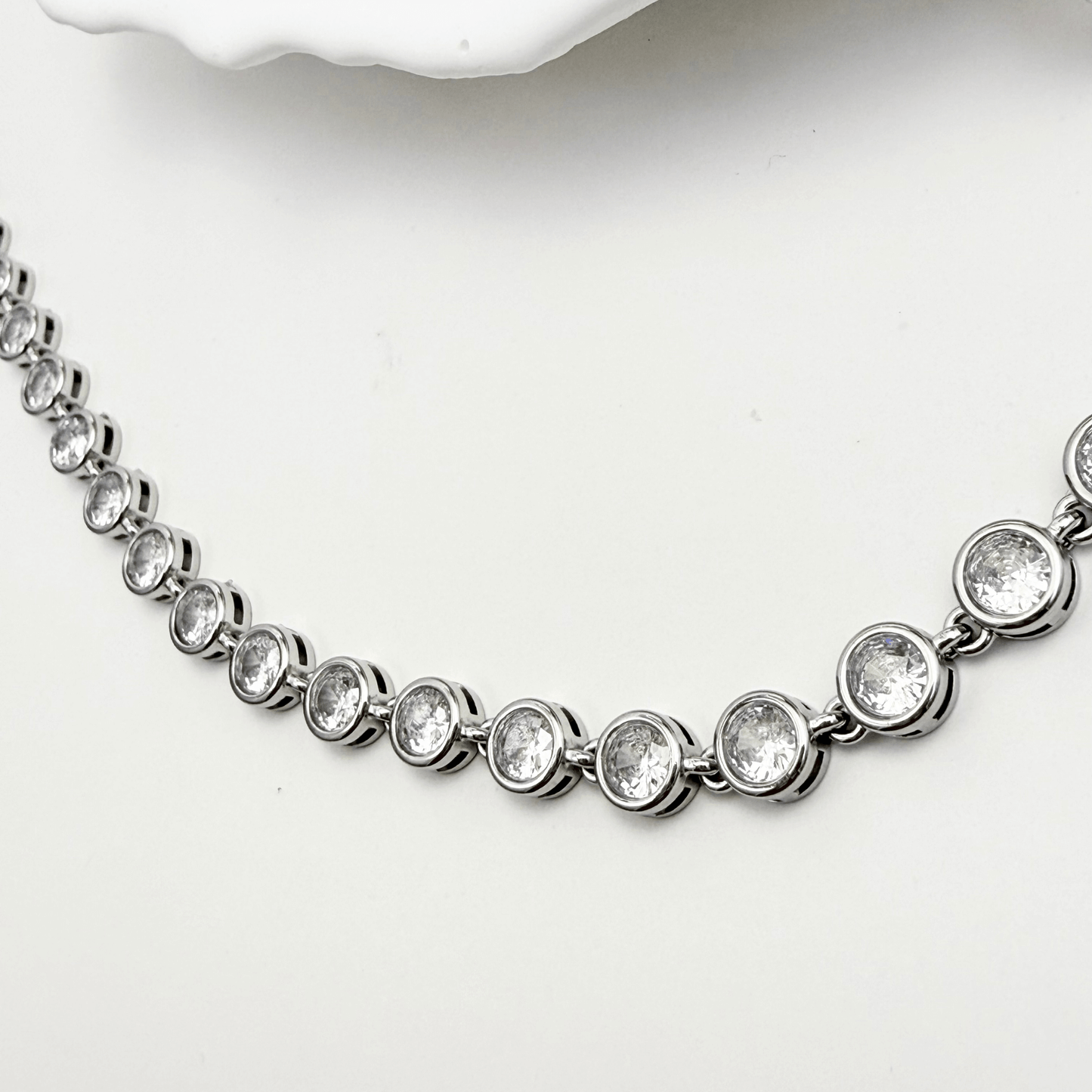 Silver crystal tennis necklace with bezel-set stones