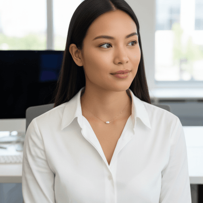 Dainty gold chain necklace with single freshwater pearl, minimalist waterproof design for layering or everyday wear.