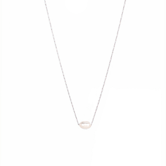 Dainty gold chain necklace with single freshwater pearl, minimalist waterproof design for layering or everyday wear.