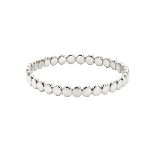 Dainty sterling silver stacking ring with small light-catching disc details