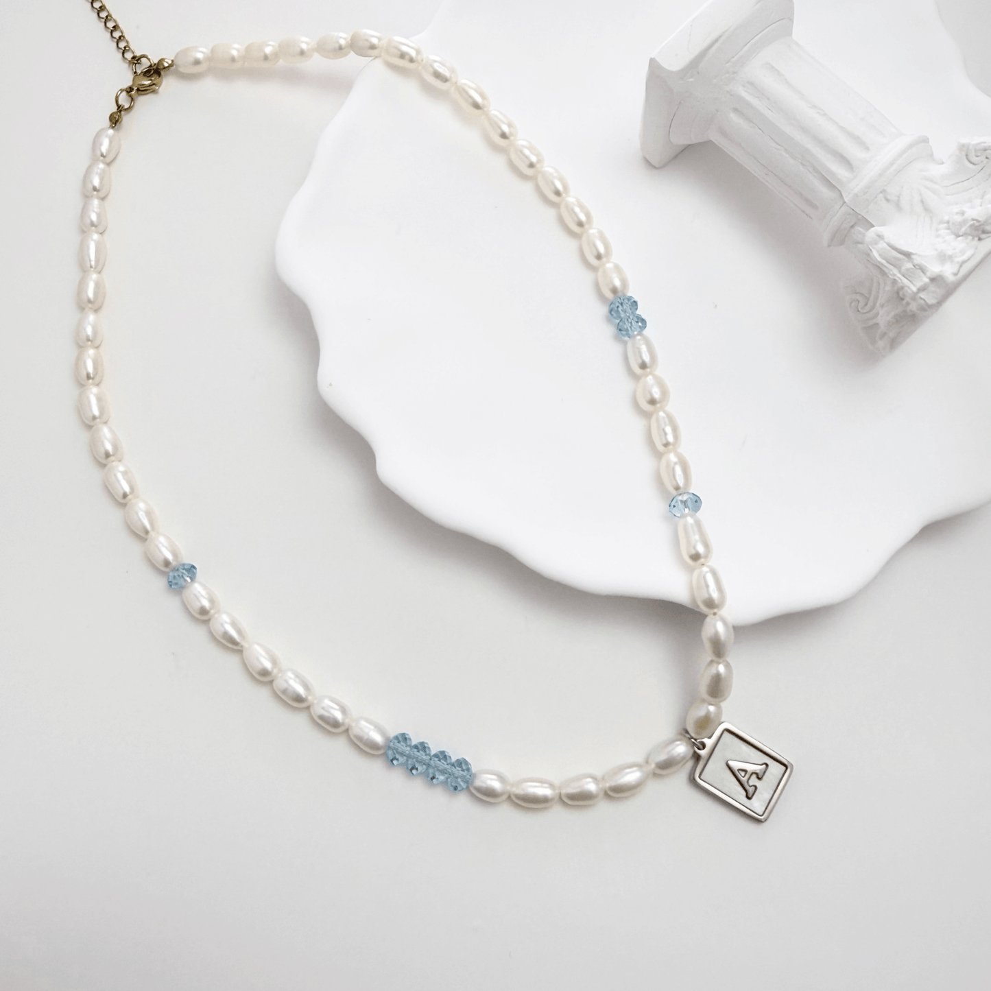 silver initial and birthstone pearl necklace featuring freshwater pearl and Swarovski element crystal, personalised elegant jewellery gift for women