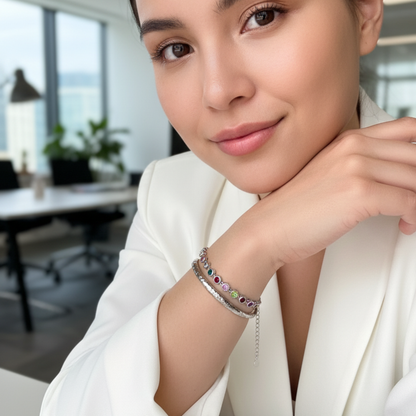 silver rainbow crystal tennis bracelet with multi-coloured bezel-set stones.