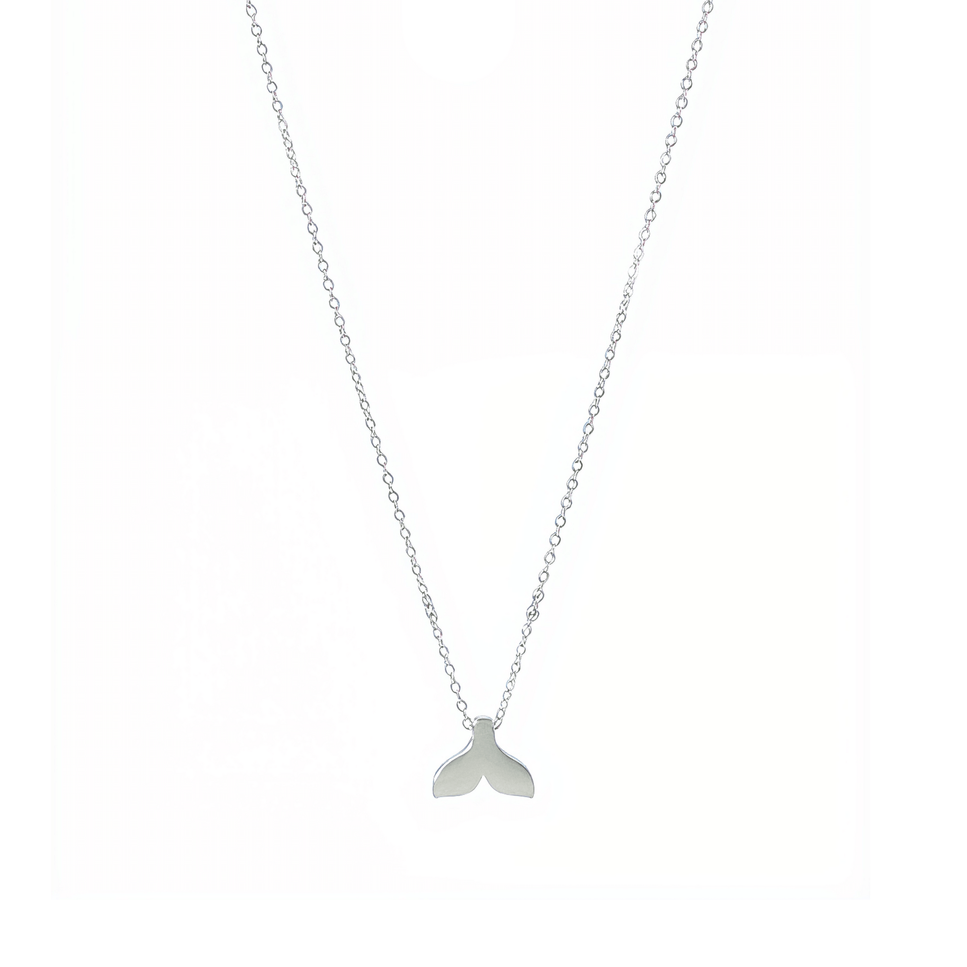 Silver whale tail pendant necklace representing freedom and ocean grace.
