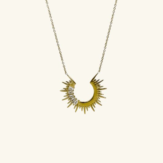 Waterproof sparkling sunburst necklace with a radiant crescent pendant in 18K PVD gold, accented with cubic zirconia