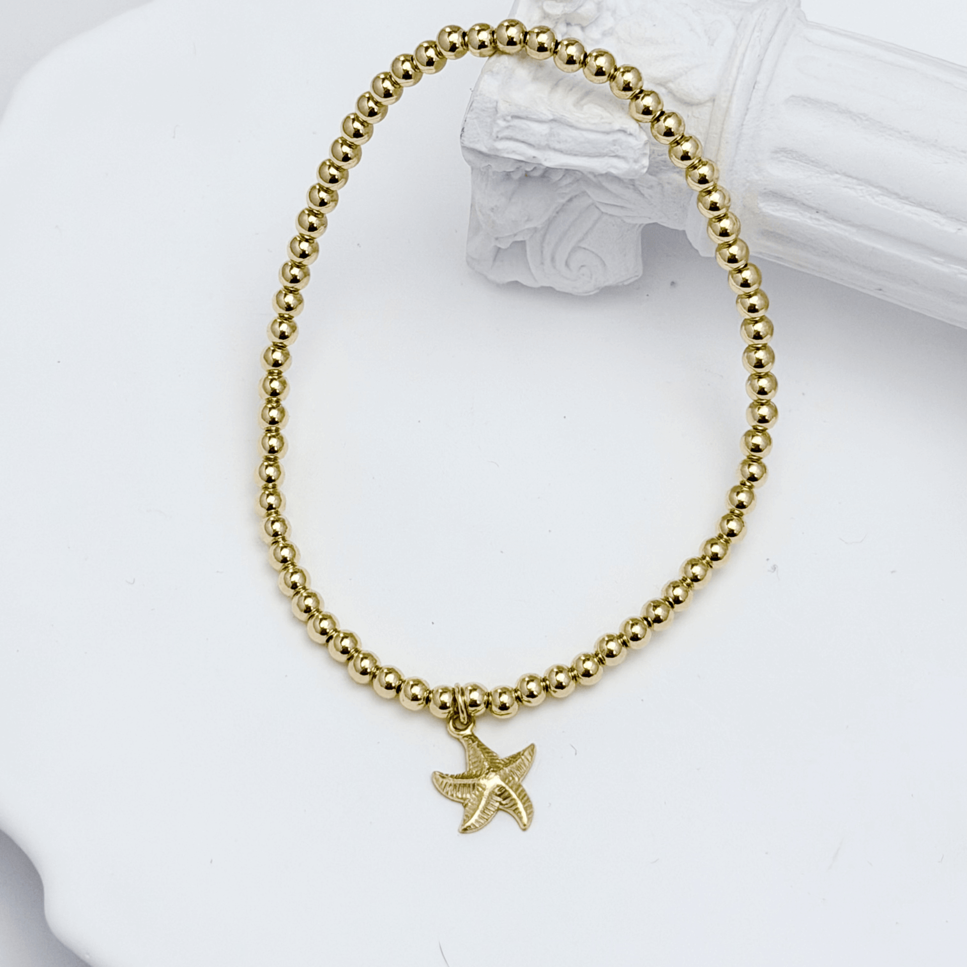 Waterproof starfish charm gold bead bracelet with textured starfish detail – MXW Jewellery
