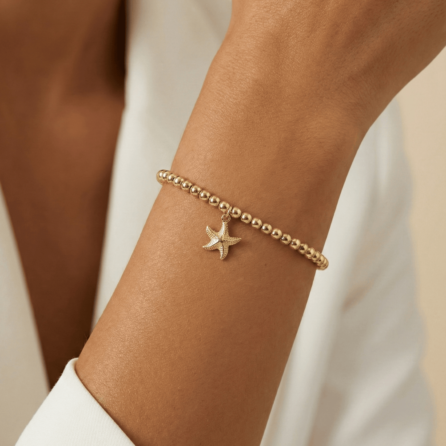 Waterproof starfish charm gold bead bracelet with textured starfish detail – MXW Jewellery