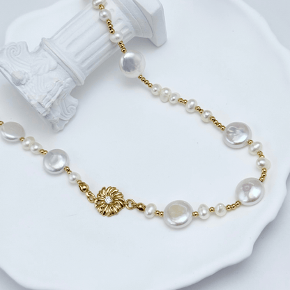 Gold and pearl sunburst necklace with baroque pearls and vintage-inspired design