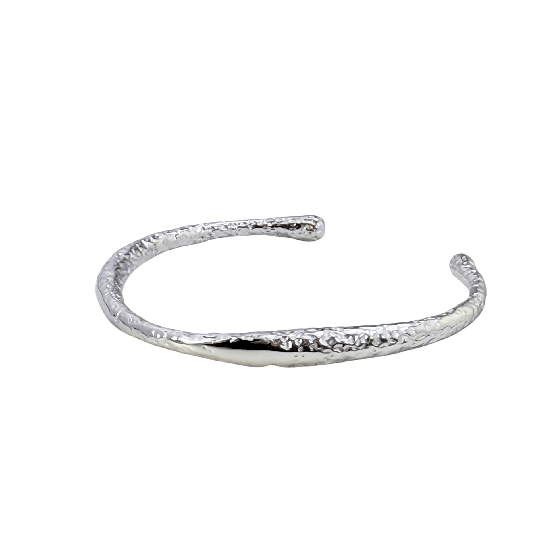 textured ripple silver cuff bracelet with polished organic finish and open adjustable design