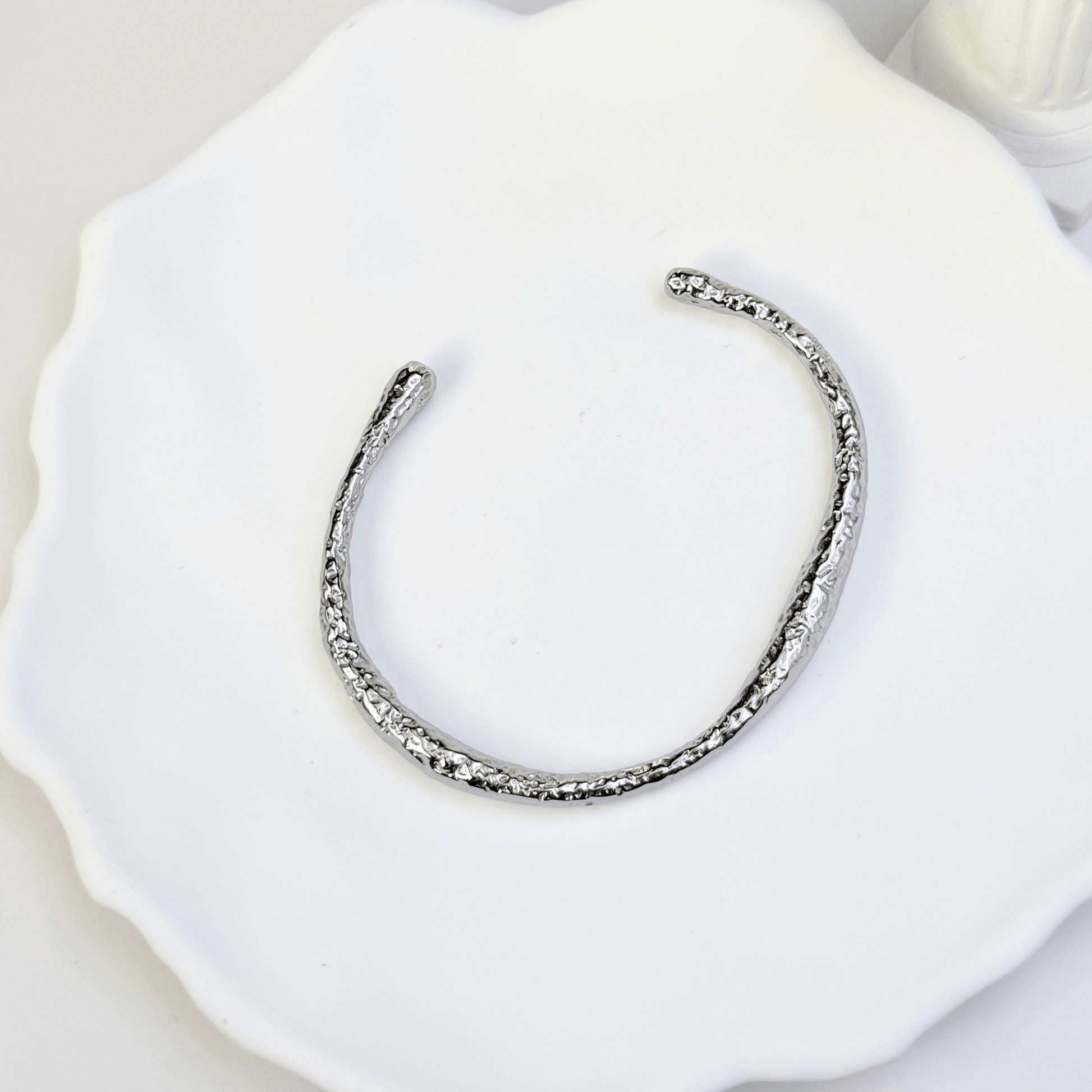 textured ripple silver cuff bracelet with polished organic finish and open adjustable design