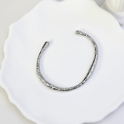 textured ripple silver cuff bracelet with polished organic finish and open adjustable design
