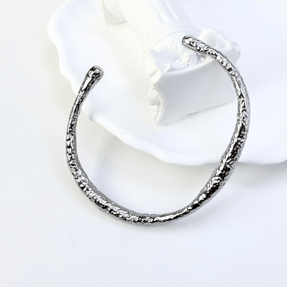 textured ripple silver cuff bracelet with polished organic finish and open adjustable design