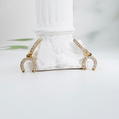 Tiny Gold Crystal Horseshoe Huggie Earrings with pave details by MXW Jewellery