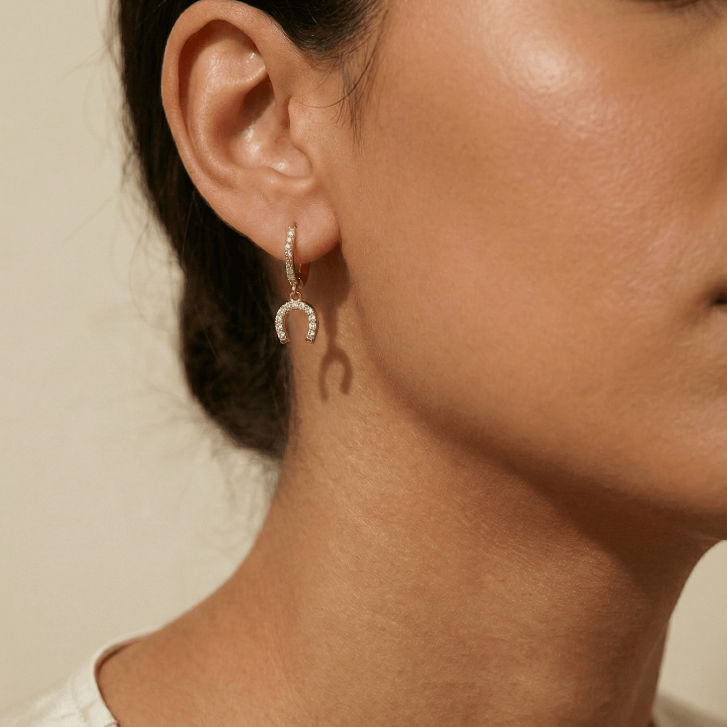 Tiny Gold Crystal Horseshoe Huggie Earrings with pave details by MXW Jewellery