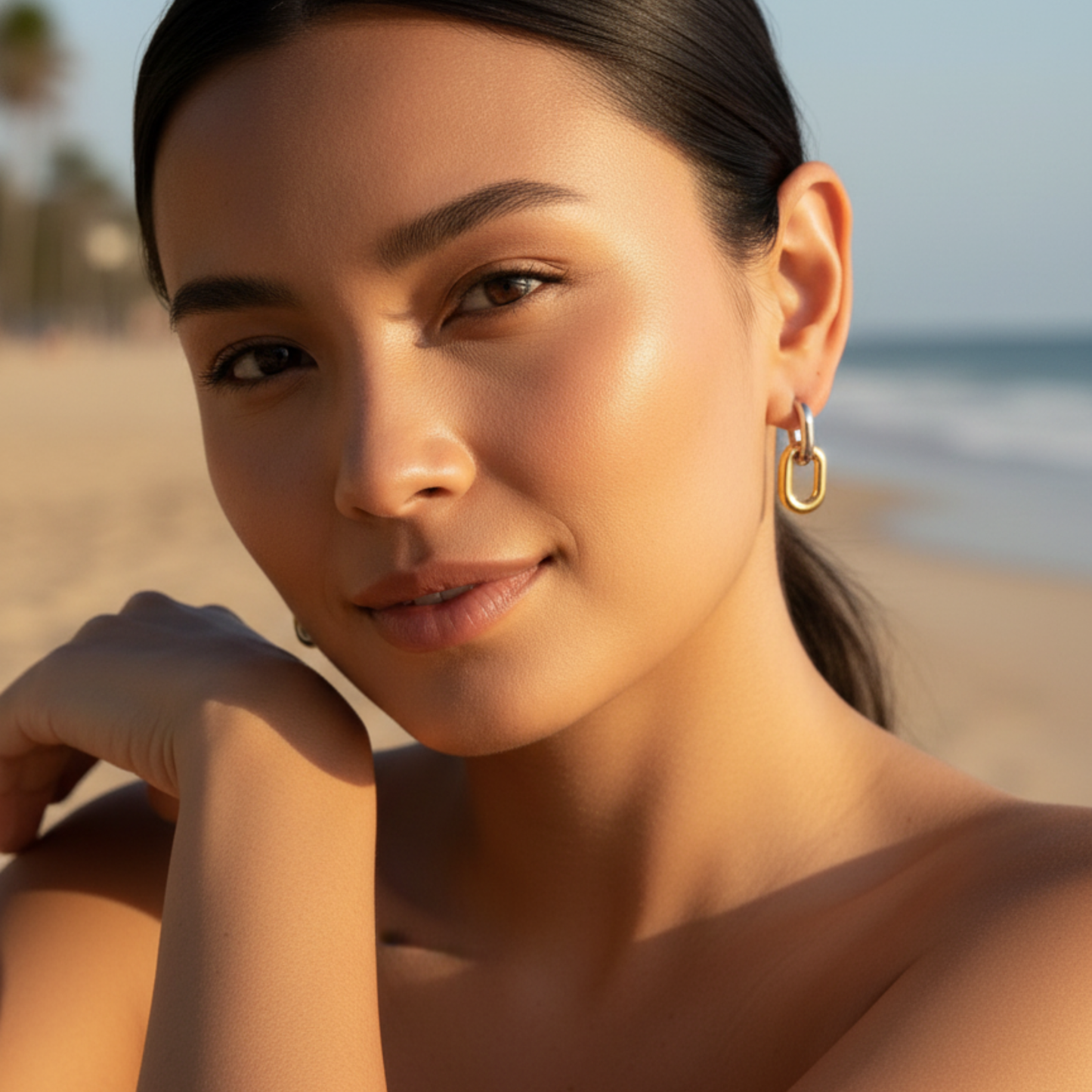 Mixed-metal link drop earrings in gold and silver.
