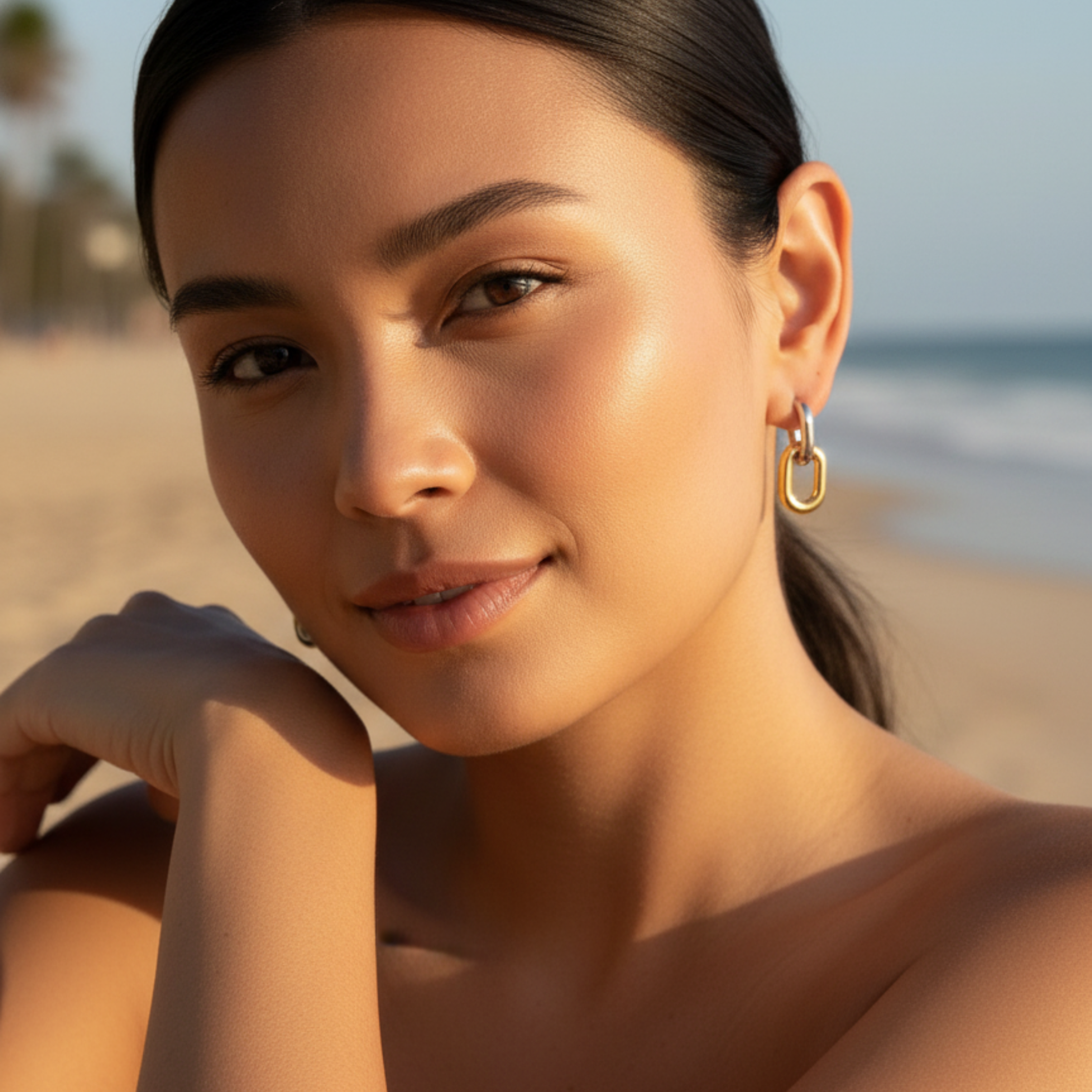 Mixed-metal link drop earrings in gold and silver.
